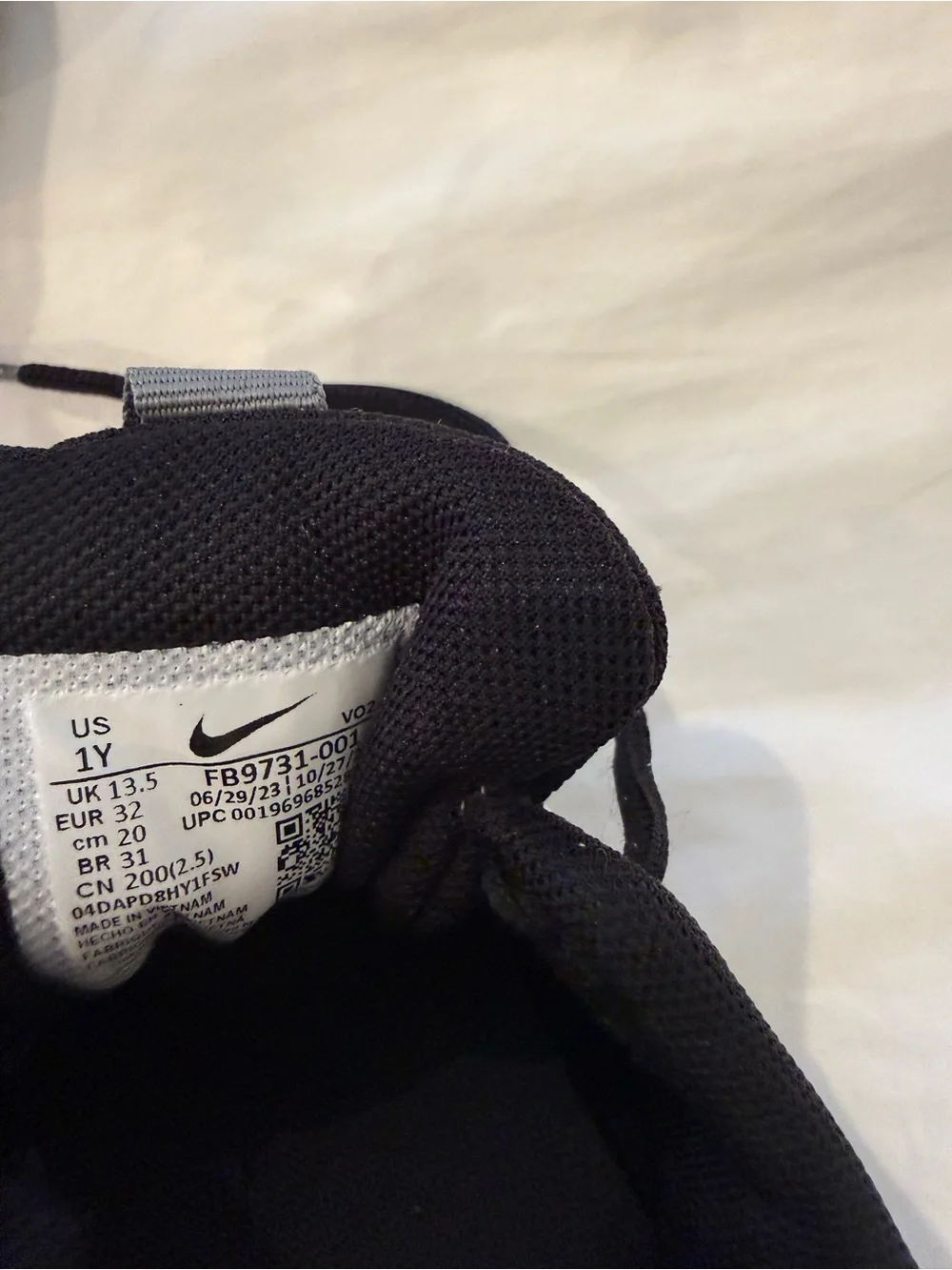 Kids Nike Black Athletic Cleats with White Accents size 1 like new